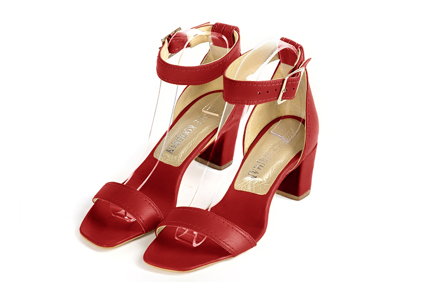 Handcrafted women's comfortable and elegant sandals with a strap around the ankle in premium scarlet red leather. Medium block heels. Square toe. Perfect for women's wedding guest heels, or elevated everyday style. 
                Choose from our luxurious collections of leather and fabric to perfectly match your sandals to your outfits.